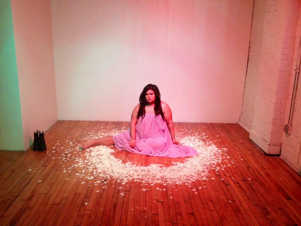 mark aguhar dressed feminine on the floor photograph